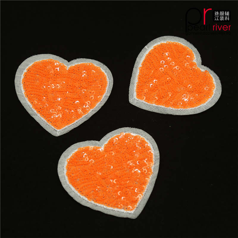 Orange hjerteform paljetter