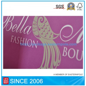 Lilla papirpose med knyttet håndtag