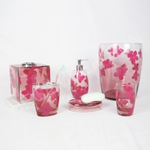 Klart glas med dekaleret badeværelsestilbehør