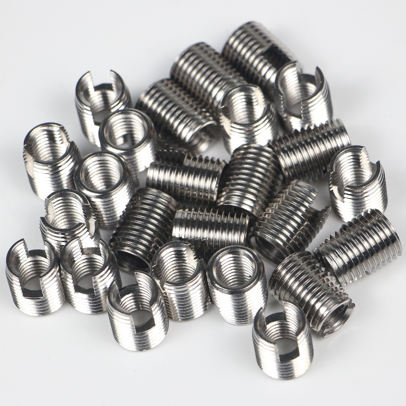 302 000 200.500 302 M20 * 2,5 * 26 * 1,5 * 27L selvskærende gevindindsatser med skærespalte