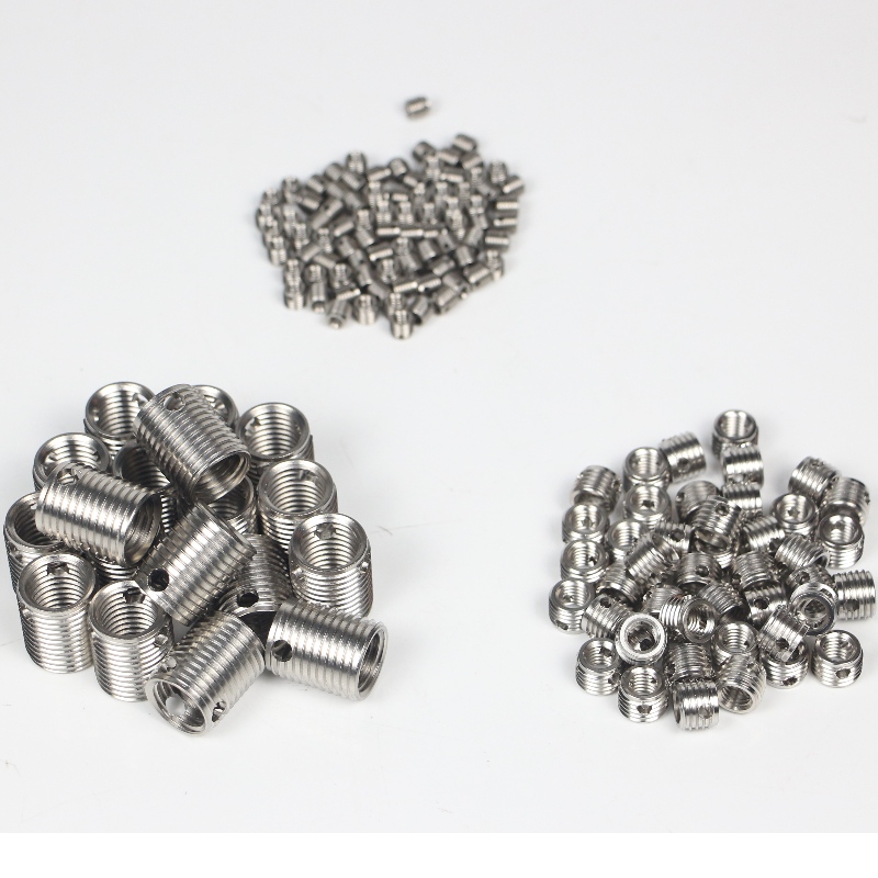 307 000 040.500 307 M4 * 0,7 * 6,5 * 0,8 * 6L selvskærende gevindindsatser med 3 huller uden burr 500K lager