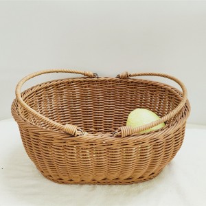 Udsøgt hånd-indpakket oval rattankurv