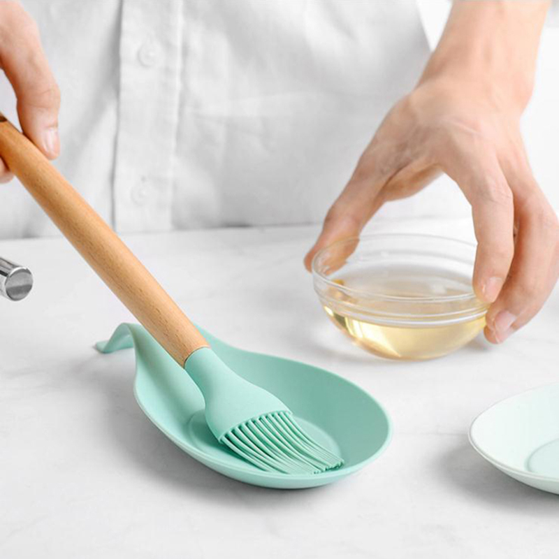 Engrosvarmebestandig køkkenkeholder Holder Almond Form Silicone Spoon Rest