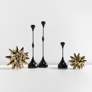 Vandfaldsformet lysestage